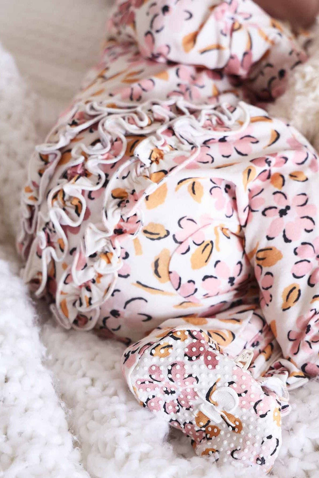Mauvelous Meadow Ruffle Zipper Footie: 6-9 months