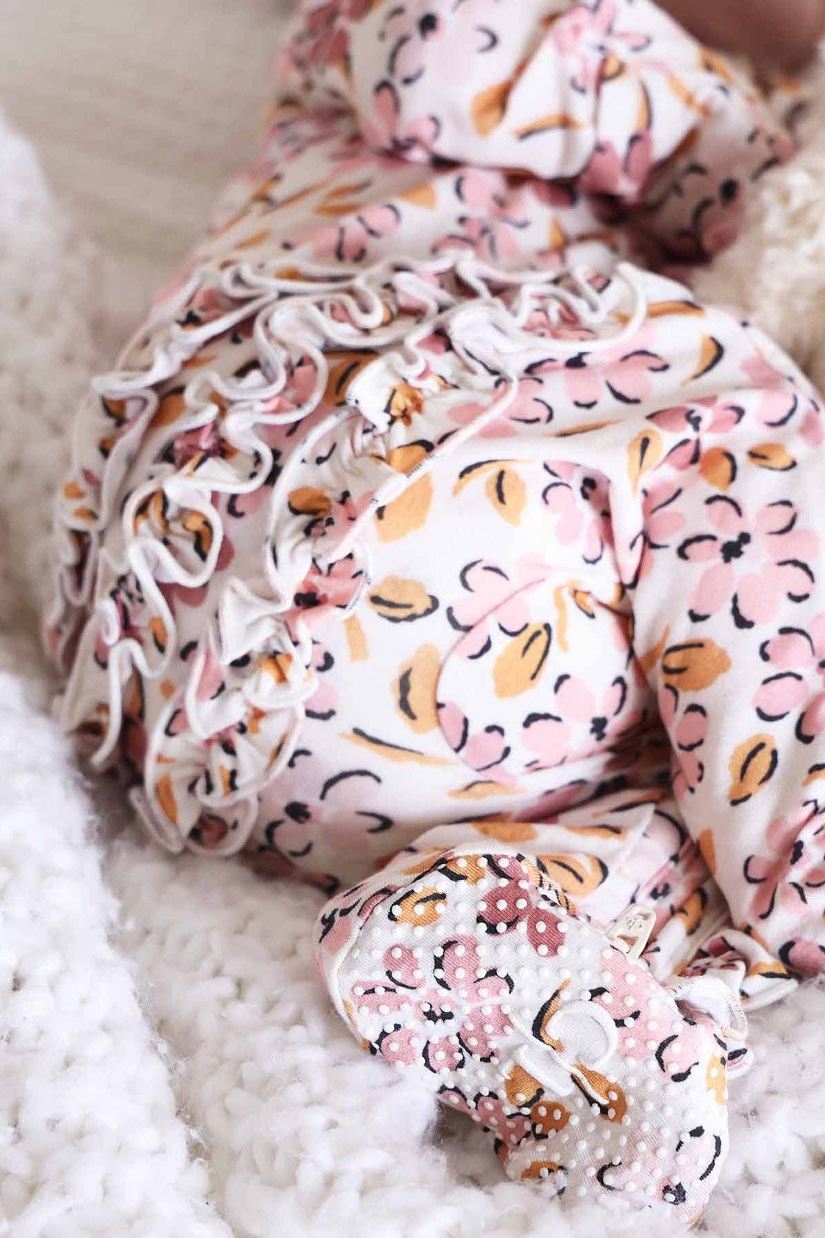 Mauvelous Meadow Ruffle Zipper Footie: 3-6 months