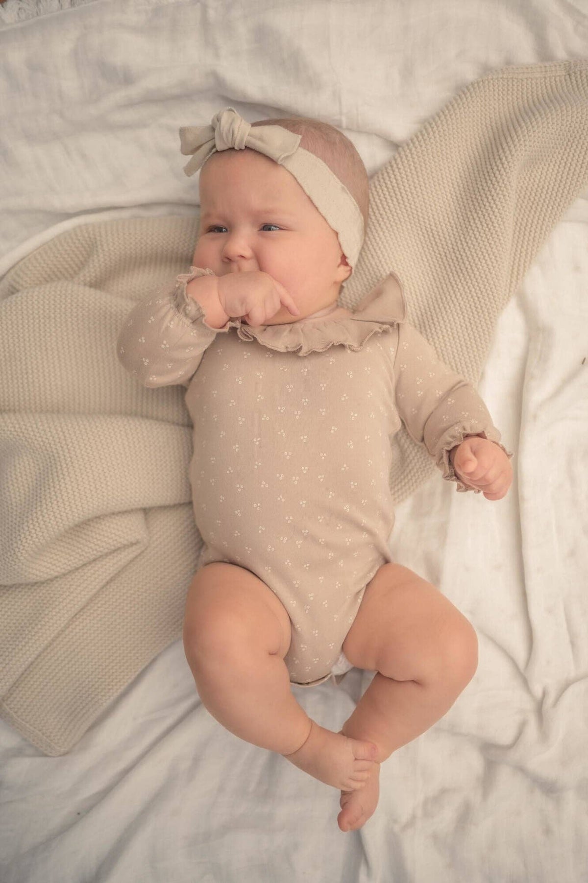 Oatmeal Dots | Organic Ruffle Neck Bodysuit: 12-18m
