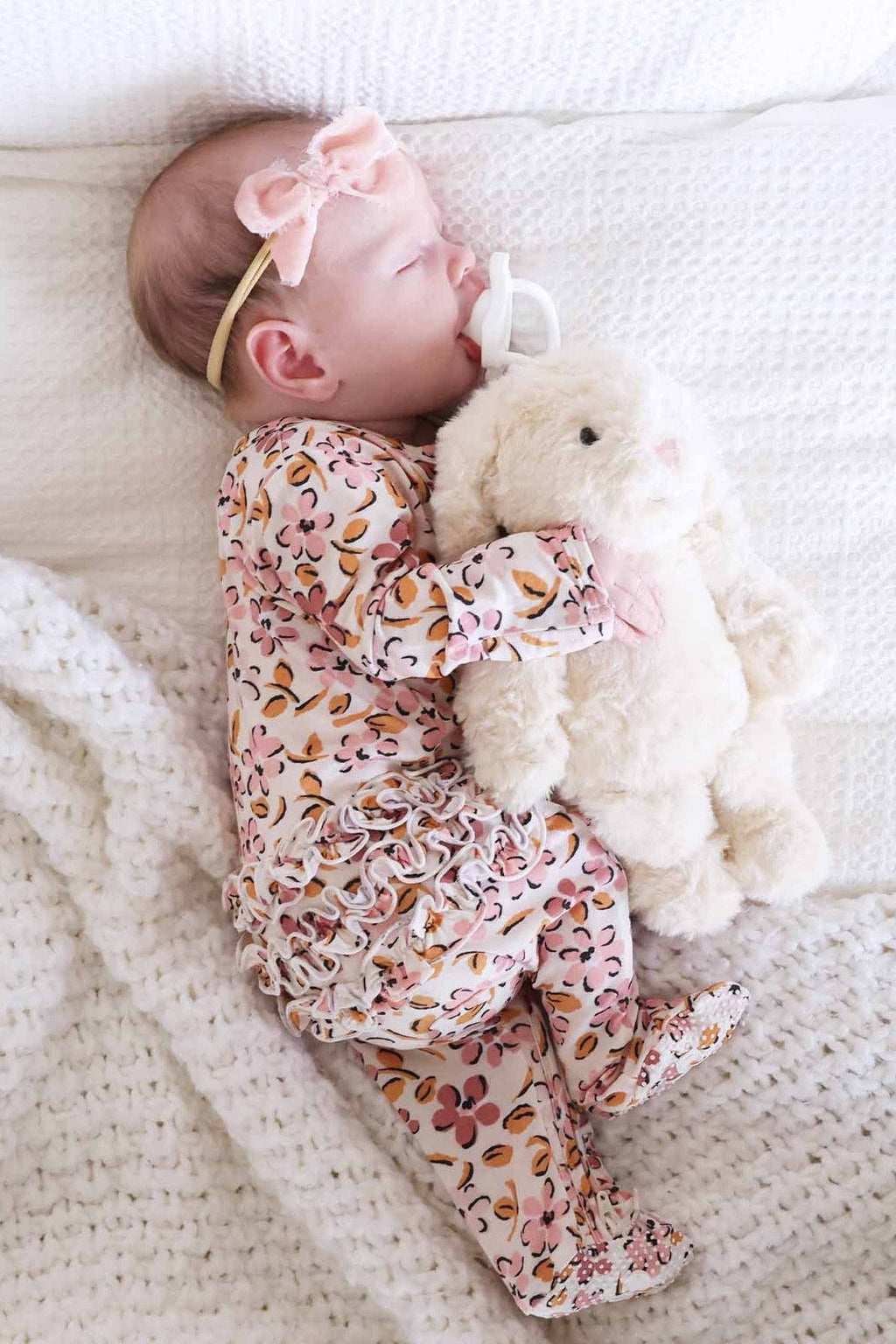 Mauvelous Meadow Ruffle Zipper Footie: 6-9 months