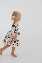 3/4 Sleeve Twirl Dress in Vintage Pink and Black Bows: Black and Pink Bows / 3